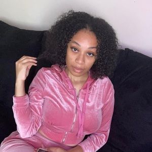 Pink velvet jogging suit.